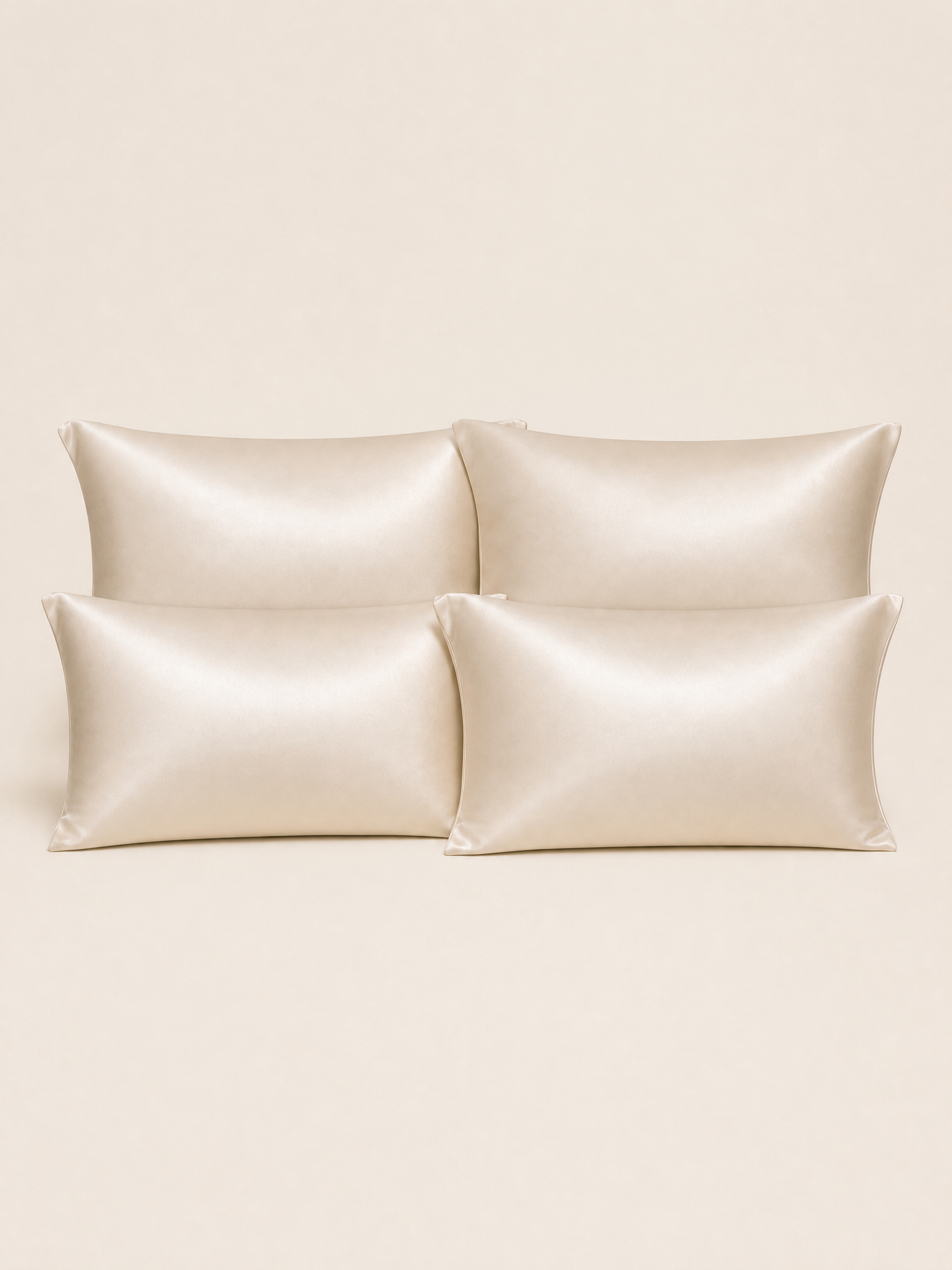 Four ivory silk pillowcases shown together as a four pack