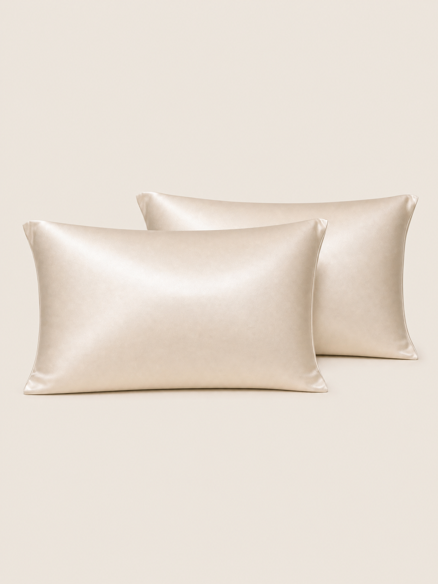 Two ivory silk pillowcases shown together as a two pack