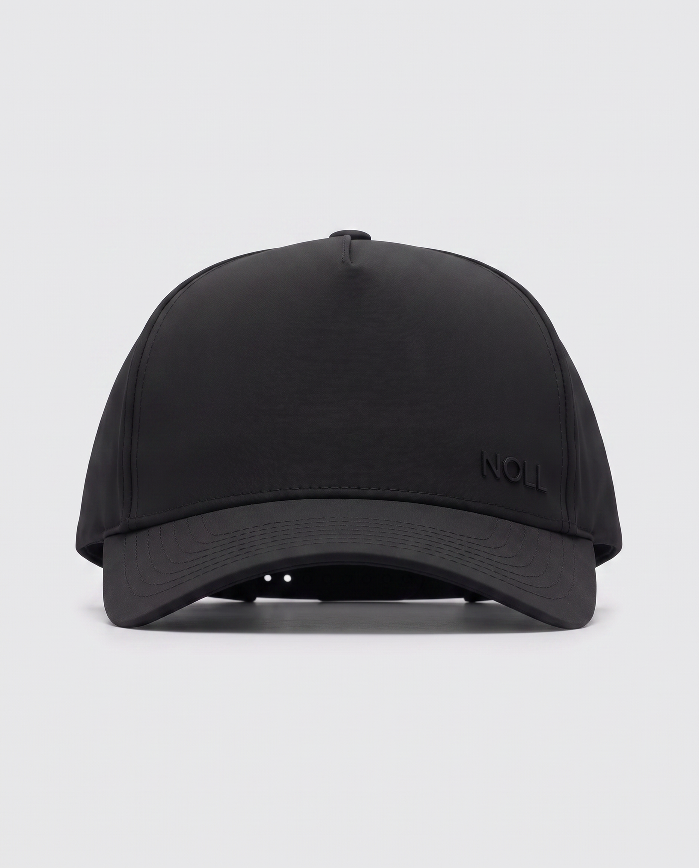 Front view of the NOLL 01 cap in matte black
