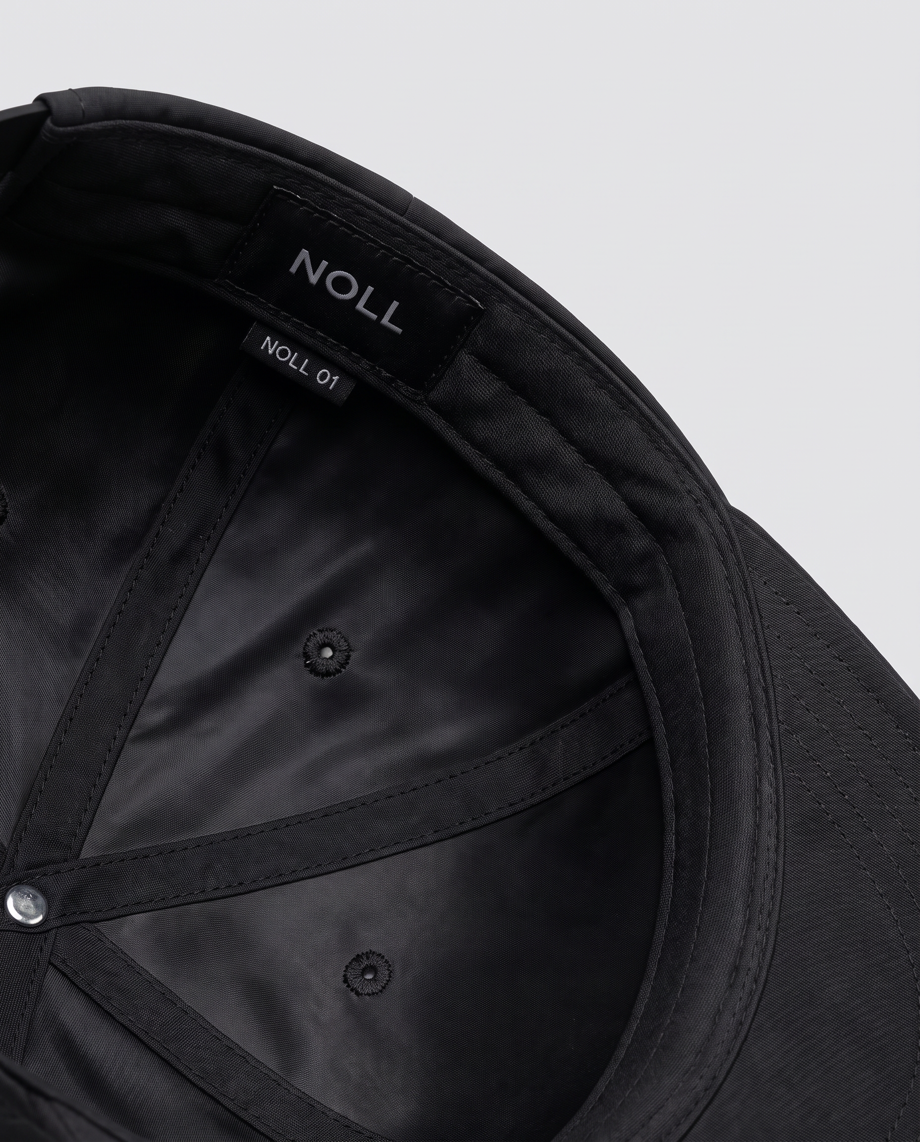 The silk-lined interior of the NOLL 01 hat